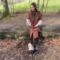 Load image into Gallery viewer, DoxieBurrow waterproof dog walking robe coat worn during a countryside walk.