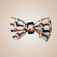 Load image into Gallery viewer, Beige sophisticated sausage dog bow tie attached to a dachshund collar with an exclusive dachshund print.
