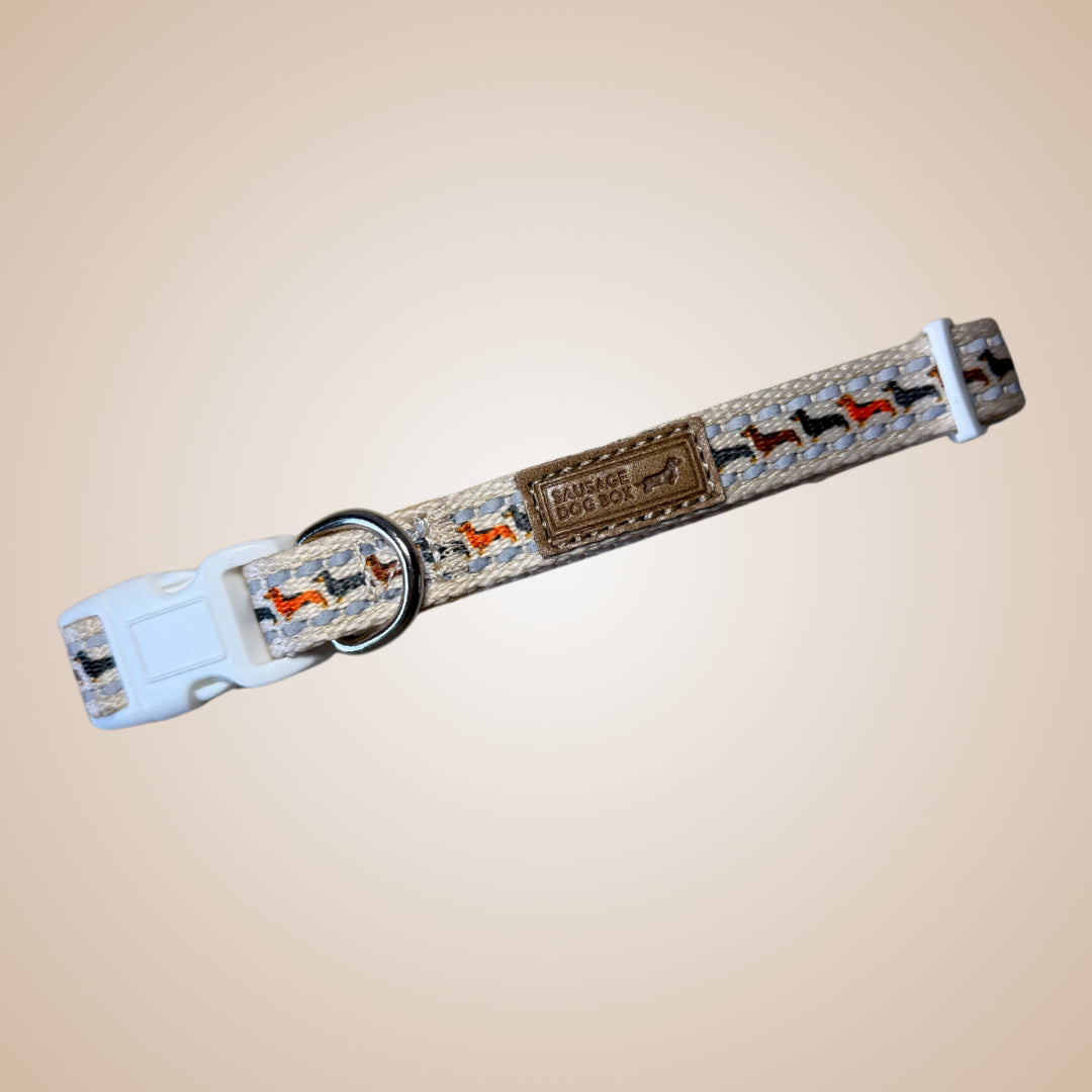 Beige dachshund collar with a sophisticated sausage dog print, designed for miniature and standard dachshunds.