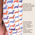 Load image into Gallery viewer, Close-up of the signature dachshund print sleeve on the DoxieBurrow waterproof dog walking robe coat.
