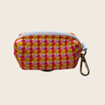 Load image into Gallery viewer, Rear view of the Tutti Fruitti dachshund dog poop bag holder with lead clip

